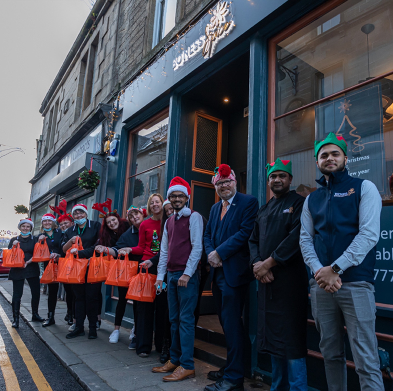 The Bo&rsquo;ness Spice team outside the restaurant on South Street